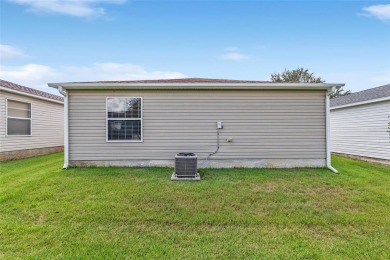 **BOND PAID!** Welcome to this Beautifully Maintained 2/2 Colony on The Links of Spruce Creek in Florida - for sale on GolfHomes.com, golf home, golf lot