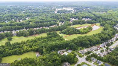 Discover this beautifully maintained 5-bedroom, 3.5 bath home on Summergrove Golf Club in Georgia - for sale on GolfHomes.com, golf home, golf lot