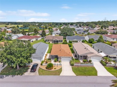 **BOND PAID!** Welcome to this Beautifully Maintained 2/2 Colony on The Links of Spruce Creek in Florida - for sale on GolfHomes.com, golf home, golf lot