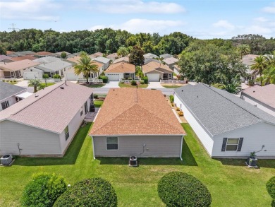 **BOND PAID!** Welcome to this Beautifully Maintained 2/2 Colony on The Links of Spruce Creek in Florida - for sale on GolfHomes.com, golf home, golf lot