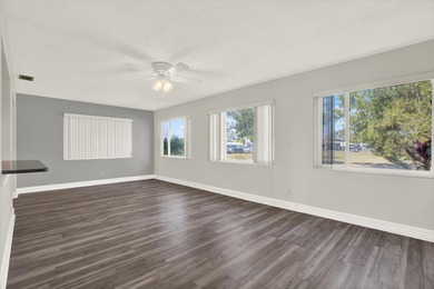 Enjoy maintenance-free, easy Florida living in this 2-bedroom on Mainlands Golf Club in Florida - for sale on GolfHomes.com, golf home, golf lot