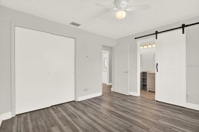 Enjoy maintenance-free, easy Florida living in this 2-bedroom on Mainlands Golf Club in Florida - for sale on GolfHomes.com, golf home, golf lot