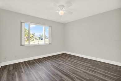 Enjoy maintenance-free, easy Florida living in this 2-bedroom on Mainlands Golf Club in Florida - for sale on GolfHomes.com, golf home, golf lot