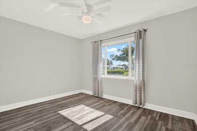 Enjoy maintenance-free, easy Florida living in this 2-bedroom on Mainlands Golf Club in Florida - for sale on GolfHomes.com, golf home, golf lot