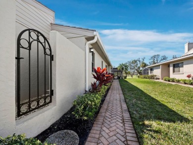 Nestled in the prestigious Harbour Oaks community on Longboat on Longboat Key Golf Club Resort in Florida - for sale on GolfHomes.com, golf home, golf lot