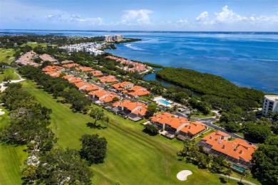 Nestled in the prestigious Harbour Oaks community on Longboat on Longboat Key Golf Club Resort in Florida - for sale on GolfHomes.com, golf home, golf lot