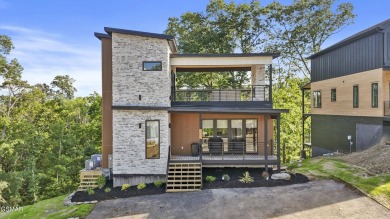 This newly constructed 2,300+ sqft cabin blends sleek modern on Sevierville Golf Club in Tennessee - for sale on GolfHomes.com, golf home, golf lot