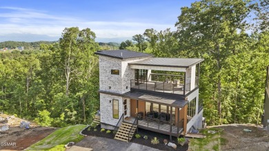 This newly constructed 2,300+ sqft cabin blends sleek modern on Sevierville Golf Club in Tennessee - for sale on GolfHomes.com, golf home, golf lot