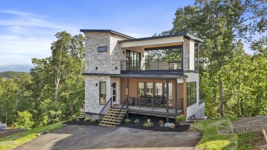 This newly constructed 2,300+ sqft cabin blends sleek modern on Sevierville Golf Club in Tennessee - for sale on GolfHomes.com, golf home, golf lot