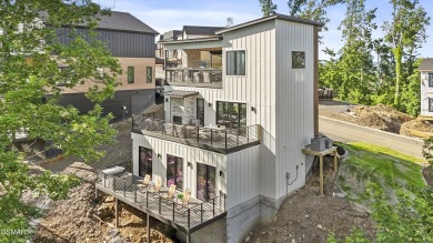 This newly constructed 2,300+ sqft cabin blends sleek modern on Sevierville Golf Club in Tennessee - for sale on GolfHomes.com, golf home, golf lot