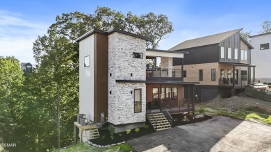 This newly constructed 2,300+ sqft cabin blends sleek modern on Sevierville Golf Club in Tennessee - for sale on GolfHomes.com, golf home, golf lot