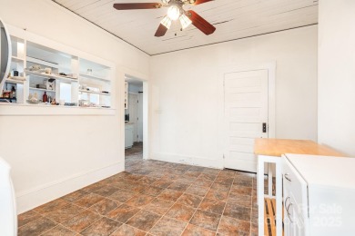 380 Woodlawn Avenue in Cramerton, NC, is a charming 2-bedroom on Cramer Mountain Country Club in North Carolina - for sale on GolfHomes.com, golf home, golf lot