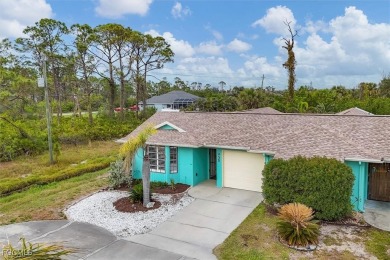Discover effortless coastal charm in this rare end-unit villa on Rotonda Golf and Country Club The Palms Course in Florida - for sale on GolfHomes.com, golf home, golf lot