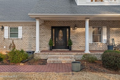 Golf-front elegance meets resort-style living in this on Deercroft Golf and Country Club in North Carolina - for sale on GolfHomes.com, golf home, golf lot