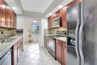 Resort Style Living - Century Village. Well maintained 2 bedroom on Flamingo Lakes Country Club in Florida - for sale on GolfHomes.com, golf home, golf lot