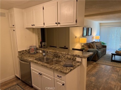 Beautiful Valencia Lakeshore condo, on the lower level, with one on Vista Valencia Golf Course in California - for sale on GolfHomes.com, golf home, golf lot