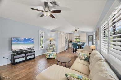 Discover effortless coastal charm in this rare end-unit villa on Rotonda Golf and Country Club The Palms Course in Florida - for sale on GolfHomes.com, golf home, golf lot