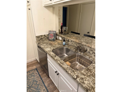 Beautiful Valencia Lakeshore condo, on the lower level, with one on Vista Valencia Golf Course in California - for sale on GolfHomes.com, golf home, golf lot