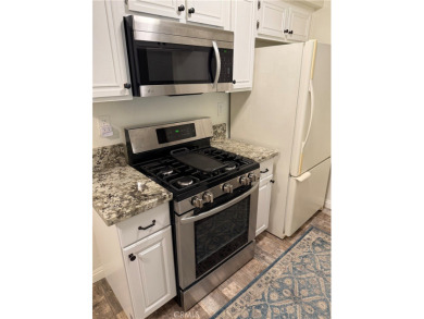 Beautiful Valencia Lakeshore condo, on the lower level, with one on Vista Valencia Golf Course in California - for sale on GolfHomes.com, golf home, golf lot