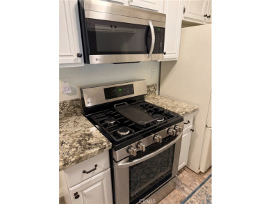 Beautiful Valencia Lakeshore condo, on the lower level, with one on Vista Valencia Golf Course in California - for sale on GolfHomes.com, golf home, golf lot