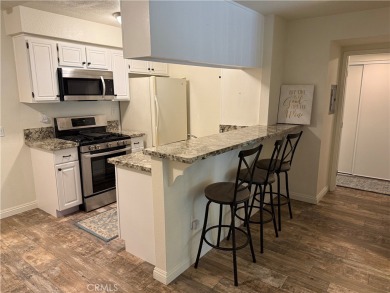 Beautiful Valencia Lakeshore condo, on the lower level, with one on Vista Valencia Golf Course in California - for sale on GolfHomes.com, golf home, golf lot