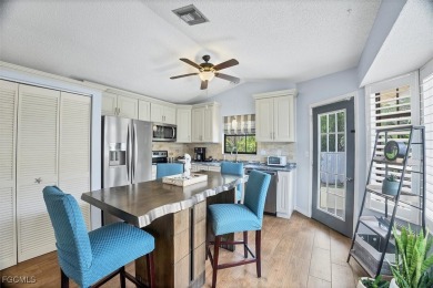 Discover effortless coastal charm in this rare end-unit villa on Rotonda Golf and Country Club The Palms Course in Florida - for sale on GolfHomes.com, golf home, golf lot