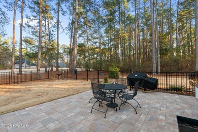Golf-front elegance meets resort-style living in this on Deercroft Golf and Country Club in North Carolina - for sale on GolfHomes.com, golf home, golf lot