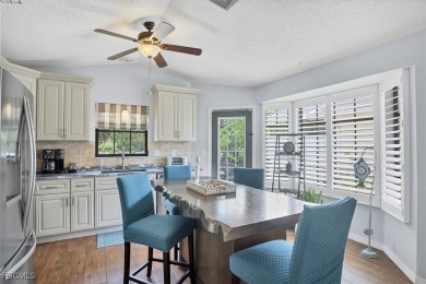 Discover effortless coastal charm in this rare end-unit villa on Rotonda Golf and Country Club The Palms Course in Florida - for sale on GolfHomes.com, golf home, golf lot