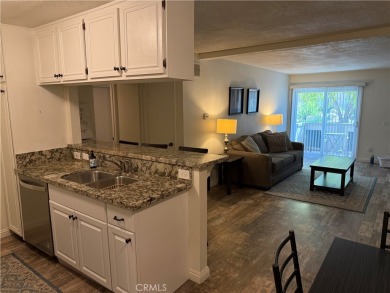 Beautiful Valencia Lakeshore condo, on the lower level, with one on Vista Valencia Golf Course in California - for sale on GolfHomes.com, golf home, golf lot