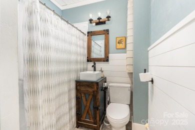 380 Woodlawn Avenue in Cramerton, NC, is a charming 2-bedroom on Cramer Mountain Country Club in North Carolina - for sale on GolfHomes.com, golf home, golf lot