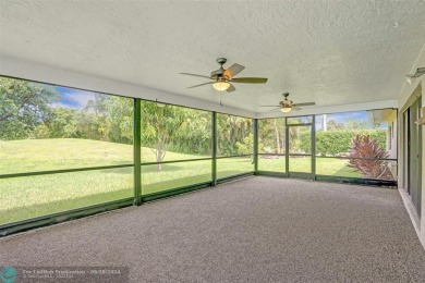 Schedule your private showing before this home hits the market on Woodmont Country Club in Florida - for sale on GolfHomes.com, golf home, golf lot