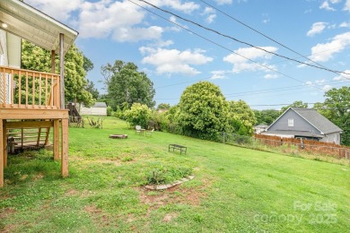 380 Woodlawn Avenue in Cramerton, NC, is a charming 2-bedroom on Cramer Mountain Country Club in North Carolina - for sale on GolfHomes.com, golf home, golf lot