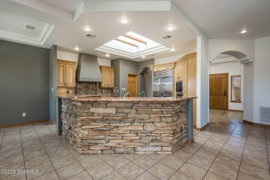 Backing onto the 7th fairway with breathtaking Organ Mountain on Sonoma Ranch Golf Course in New Mexico - for sale on GolfHomes.com, golf home, golf lot