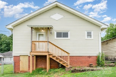 380 Woodlawn Avenue in Cramerton, NC, is a charming 2-bedroom on Cramer Mountain Country Club in North Carolina - for sale on GolfHomes.com, golf home, golf lot