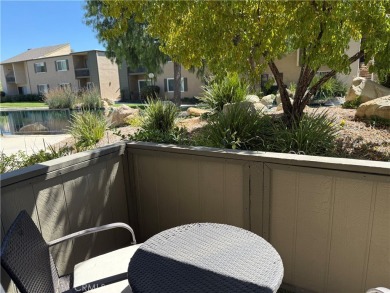 Beautiful Valencia Lakeshore condo, on the lower level, with one on Vista Valencia Golf Course in California - for sale on GolfHomes.com, golf home, golf lot