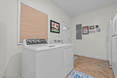 Golf-front elegance meets resort-style living in this on Deercroft Golf and Country Club in North Carolina - for sale on GolfHomes.com, golf home, golf lot