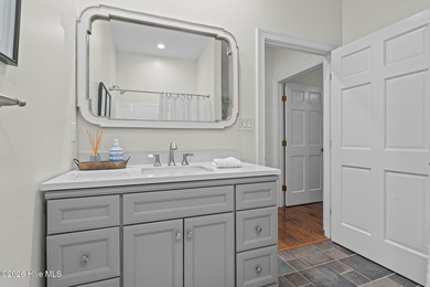 Golf-front elegance meets resort-style living in this on Deercroft Golf and Country Club in North Carolina - for sale on GolfHomes.com, golf home, golf lot