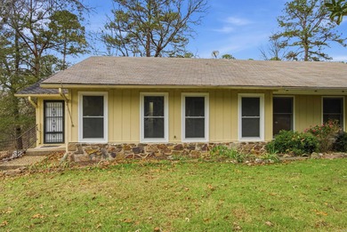 This charming, fully renovated 2-bed/1-bath townhome is ideal as on DeSoto Golf Course in Arkansas - for sale on GolfHomes.com, golf home, golf lot