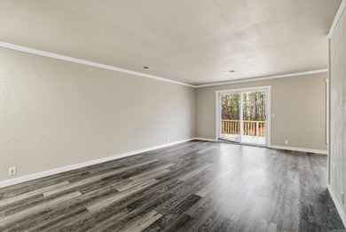 This charming, fully renovated 2-bed/1-bath townhome is ideal as on DeSoto Golf Course in Arkansas - for sale on GolfHomes.com, golf home, golf lot