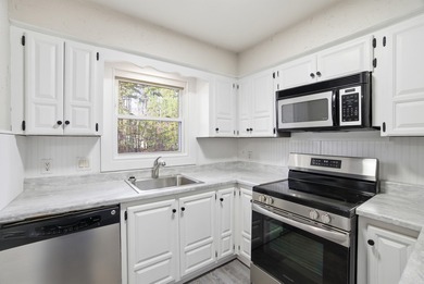 This charming, fully renovated 2-bed/1-bath townhome is ideal as on DeSoto Golf Course in Arkansas - for sale on GolfHomes.com, golf home, golf lot