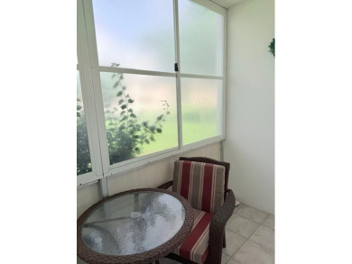Lovely furnished 1 bedroom 1.5 bath unit in quiet location near on Hillsboro Pines Golf in Florida - for sale on GolfHomes.com, golf home, golf lot