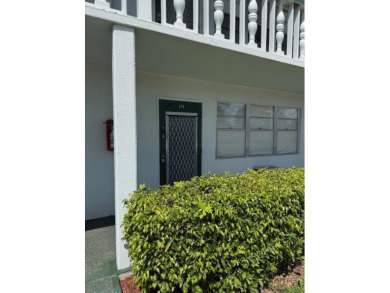 Lovely furnished 1 bedroom 1.5 bath unit in quiet location near on Hillsboro Pines Golf in Florida - for sale on GolfHomes.com, golf home, golf lot