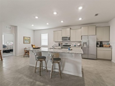 Built in 2023 in the all ages area! This 4 bedroom, 3 full on Trilogy at Ocala Preserve in Florida - for sale on GolfHomes.com, golf home, golf lot