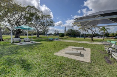 Lovely furnished 1 bedroom 1.5 bath unit in quiet location near on Hillsboro Pines Golf in Florida - for sale on GolfHomes.com, golf home, golf lot