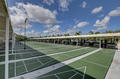 Lovely furnished 1 bedroom 1.5 bath unit in quiet location near on Hillsboro Pines Golf in Florida - for sale on GolfHomes.com, golf home, golf lot