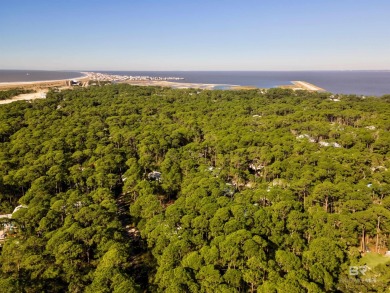 The living is laid back and easy on Dauphin Island and there's on Isle Dauphine Club Golf Course in Alabama - for sale on GolfHomes.com, golf home, golf lot