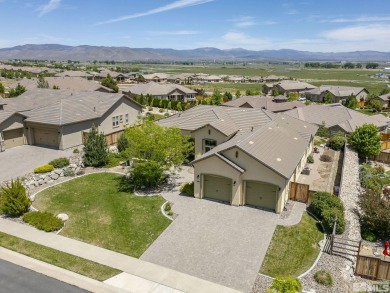 Located inside the gated golf course community of Genoa Lakes on Genoa Lakes Resort Course - Carson City in Nevada - for sale on GolfHomes.com, golf home, golf lot