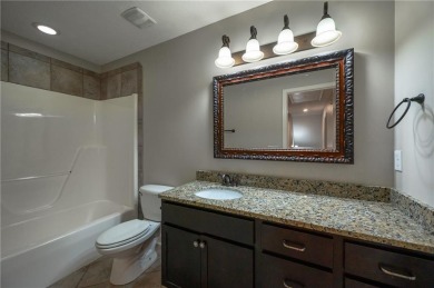 Tucked into the storybook charm of Eagle Pointe-just across the on Lakewood Golf Course in Alabama - for sale on GolfHomes.com, golf home, golf lot