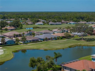STUNNING CURB APPEAL on this GORGEOUS FULLY REMODELED PANORAMIC on Tampa Bay Golf and Country Club in Florida - for sale on GolfHomes.com, golf home, golf lot