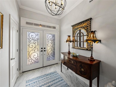 STUNNING CURB APPEAL on this GORGEOUS FULLY REMODELED PANORAMIC on Tampa Bay Golf and Country Club in Florida - for sale on GolfHomes.com, golf home, golf lot